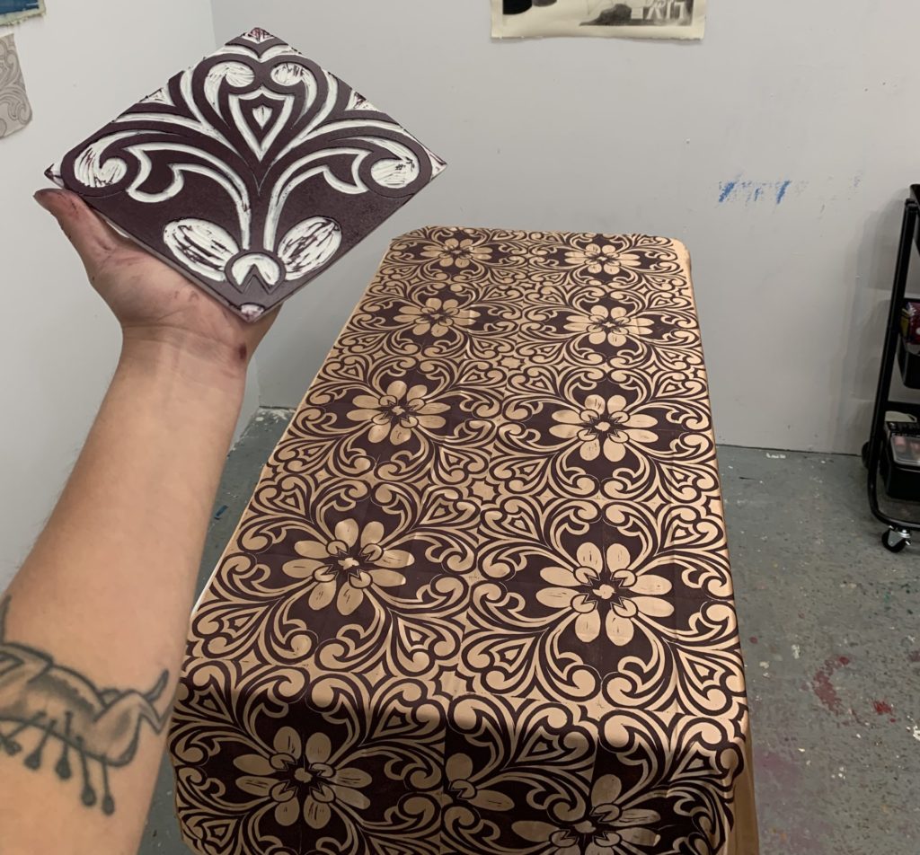 Linocut printing on fabric by Alyssa Aviles